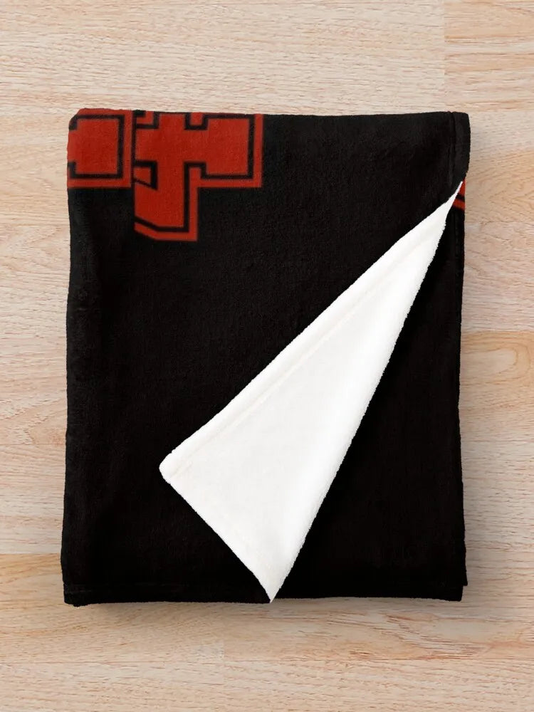 A black knit throw blanket featuring a red and gold NFL team logo design.