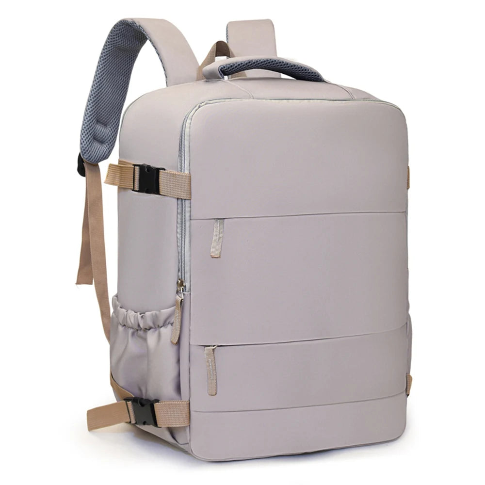 A light gray compact cabin travel backpack with gray straps and buckles.