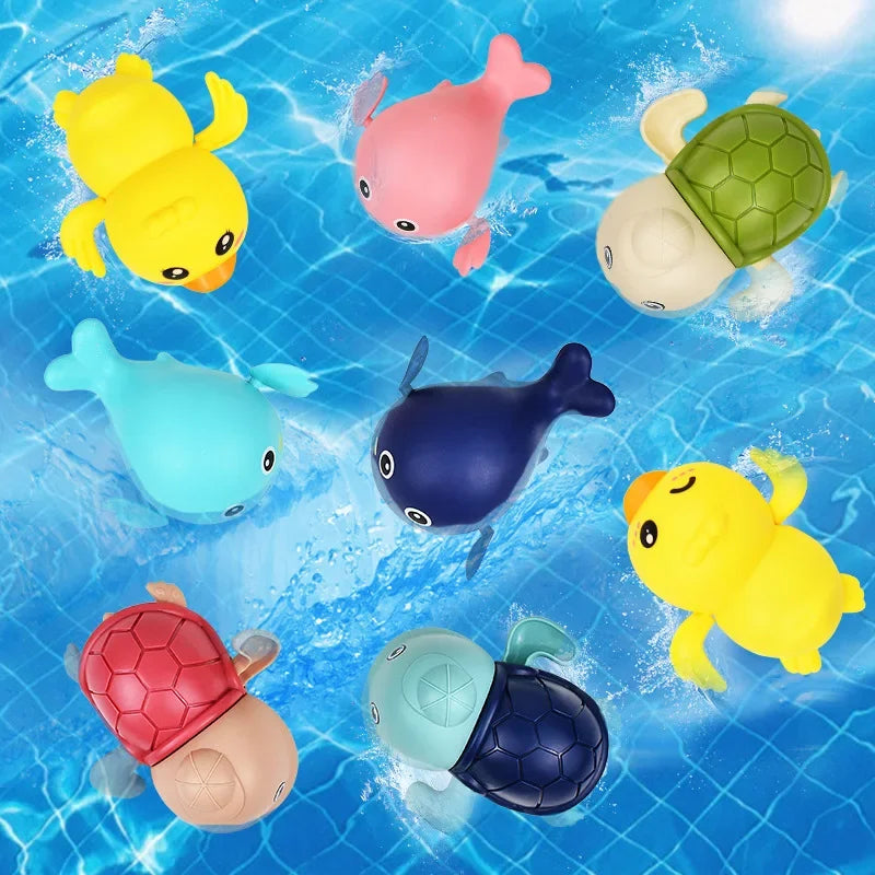 A collection of colorful wind-up bath toys featuring cartoon turtles, ducks, and whales floating in blue water.