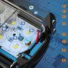 An exploded view of an aluminum LED flood light pod assembly showing various components like PCB boards, thermal pads, and le