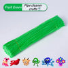 A green pipe cleaner craft set featuring various animal shapes like a pink horse, red bird, and blue octopus.