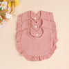 A set of three pink soft cotton ruffle bibs for babies displayed on a light background.