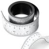 A black magnetic flexible measuring ruler with a white scale is shown, including a coiled and an uncoiled version.