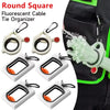 Round square fluorescent cable tie organizer with carabiner clip shown attached to a black fabric.