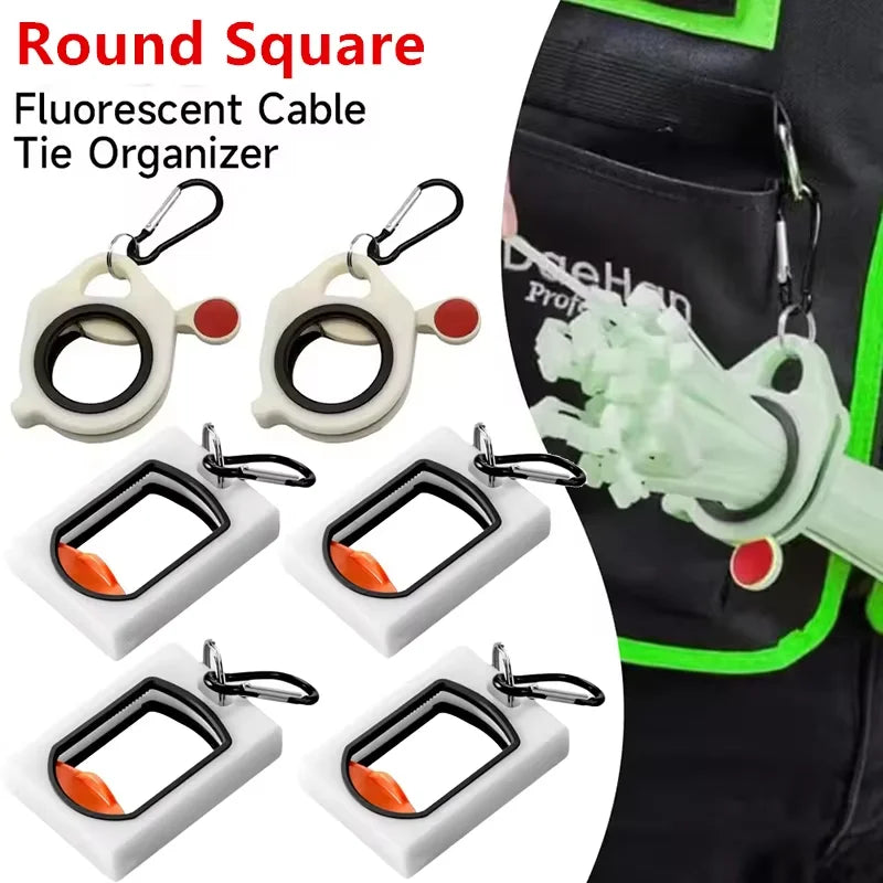 Round square fluorescent cable tie organizer with carabiner clip shown attached to a black fabric.