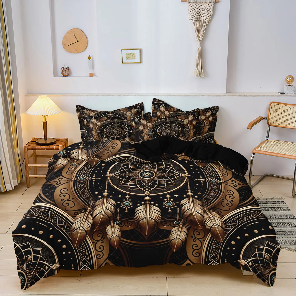 A black and gold tribal dreamcatcher duvet cover set with matching pillowcases displayed on a bed.
