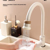 A hand is using a white kitchen faucet sprayer with a filter to dispense clean water for washing and caring for skin.