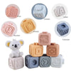 A collection of soft silicone building blocks in various shapes and colors including fruit, letter, animal, convex, and conca