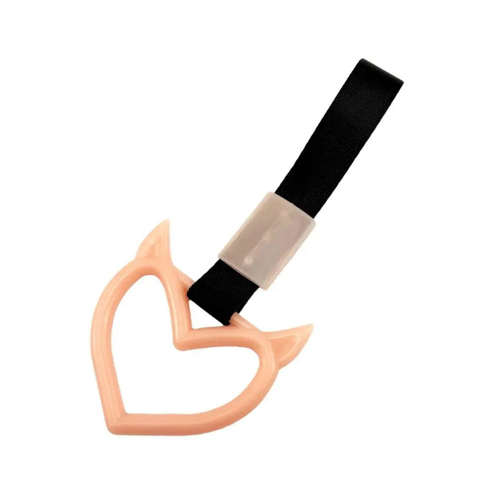 Heart-shaped car handle decor with a holographic finish and black strap
