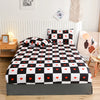 Black and white checkered fitted bed sheet with a marbled print design
