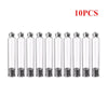Ten clear glass vials with metal stoppers arranged in a row for storage.