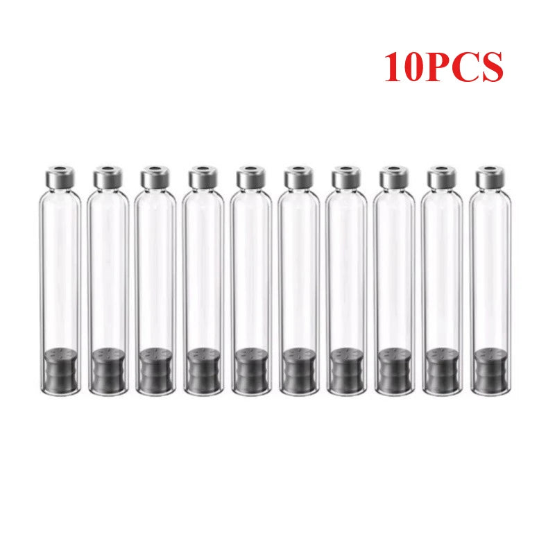 Ten clear glass vials with metal stoppers arranged in a row for storage.