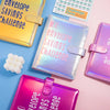 A collection of colorful envelopes and a savings challenge guide displayed on a pink and blue background.