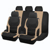 A set of black and tan two-tone car seat covers shown in a row.