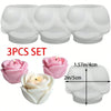 A set of three white silicone rose flower molds for crafting candles, soap, and resin