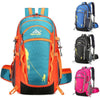 An orange and teal hiking backpack with black accents shown from the back.