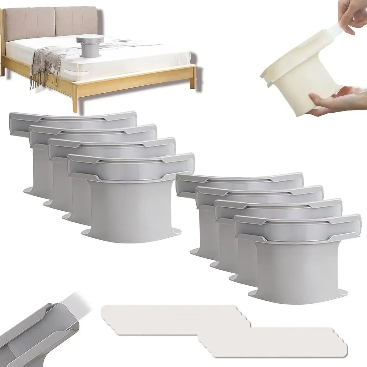 A set of bed sheet corner grippers and straps in a light beige color, shown with a flat bed and a hand holding a single gripp