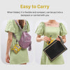 A woman is shown carrying a foldable reusable shopping tote bag in a light green dress.
