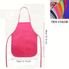 Pink non-woven fabric craft apron shown flat with dimensions 48cm by 33cm