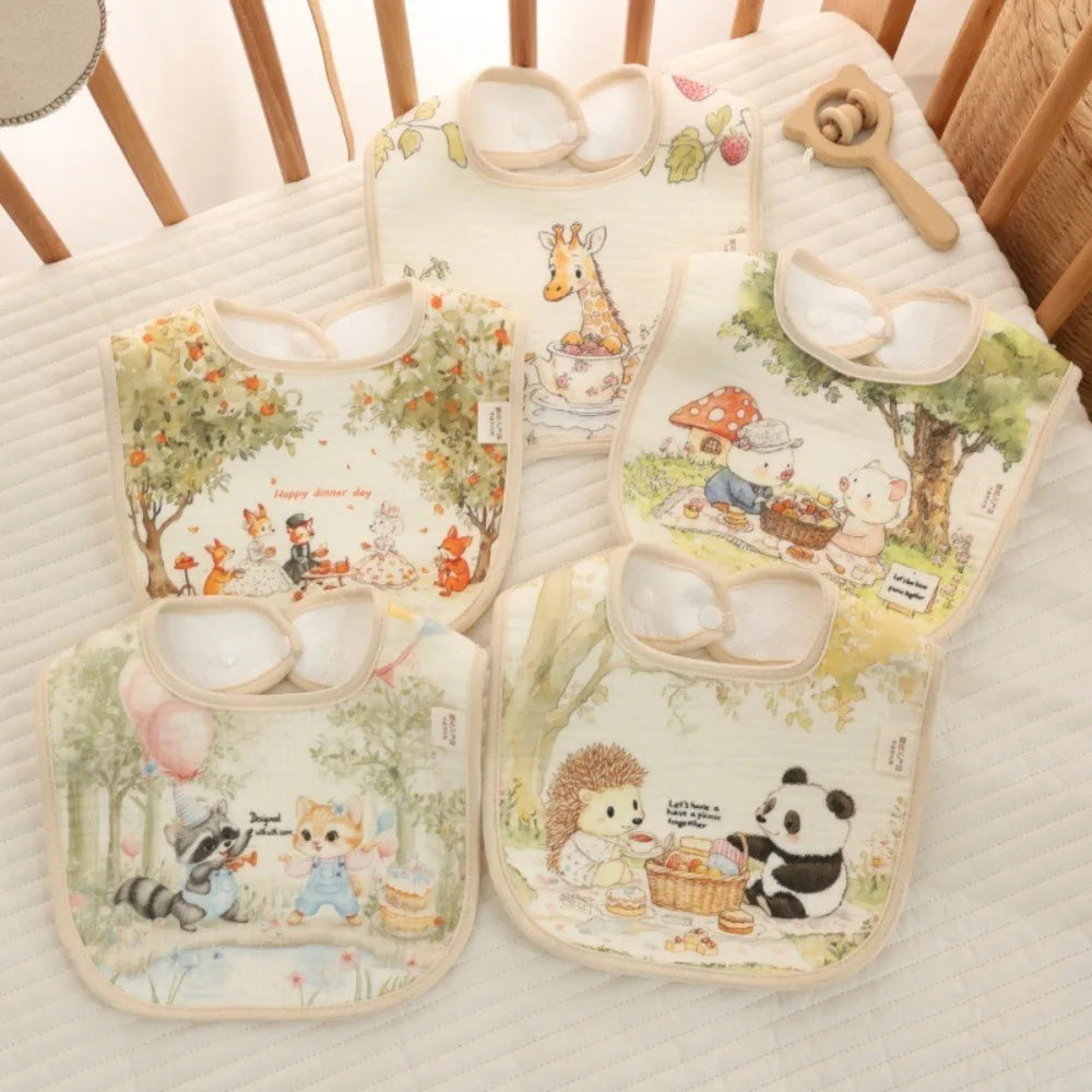 A set of soft cotton waterproof baby bibs with adjustable necks featuring cute animal designs and floral patterns.