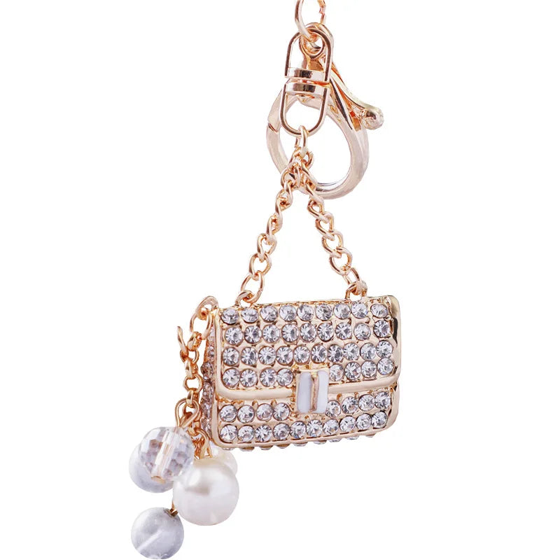Gold crystal rhinestone handbag keychain with pearl accents