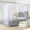 A princess-style lace canopy mosquito net draped over a bed in a bedroom setting.