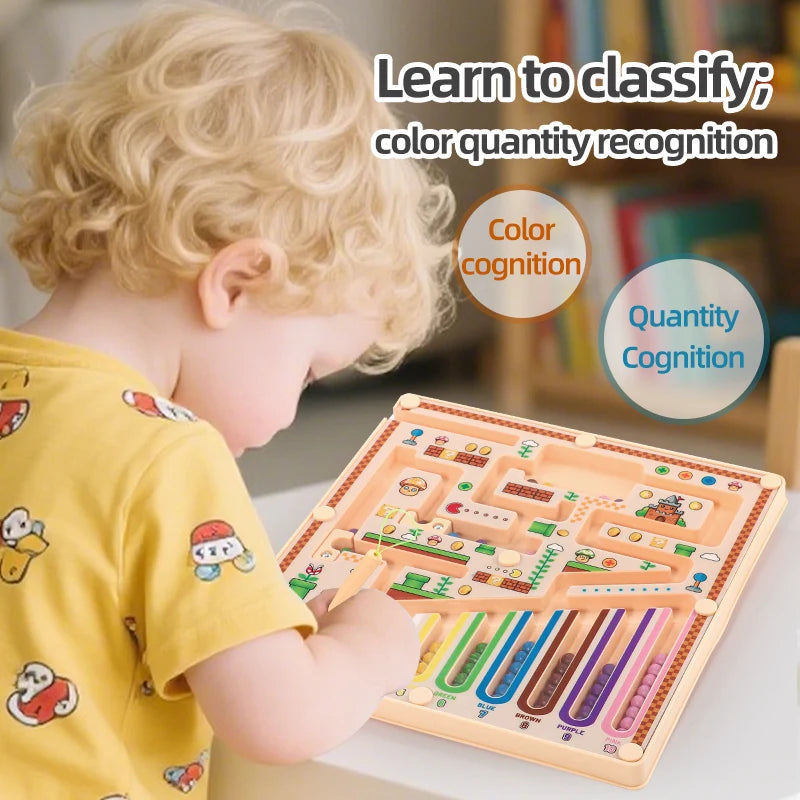 A young child is playing a magnetic maze logic puzzle board designed to teach color and quantity recognition.