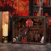 A dark wooden miniature shelf insert for a DIY book nook kit featuring spooky Halloween figures and red LED lights.