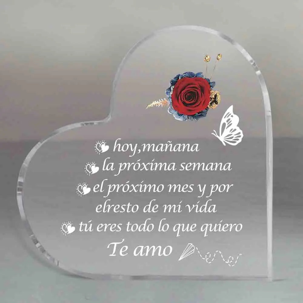 Clear acrylic heart plaque engraved with a red rose and text in Spanish expressing love