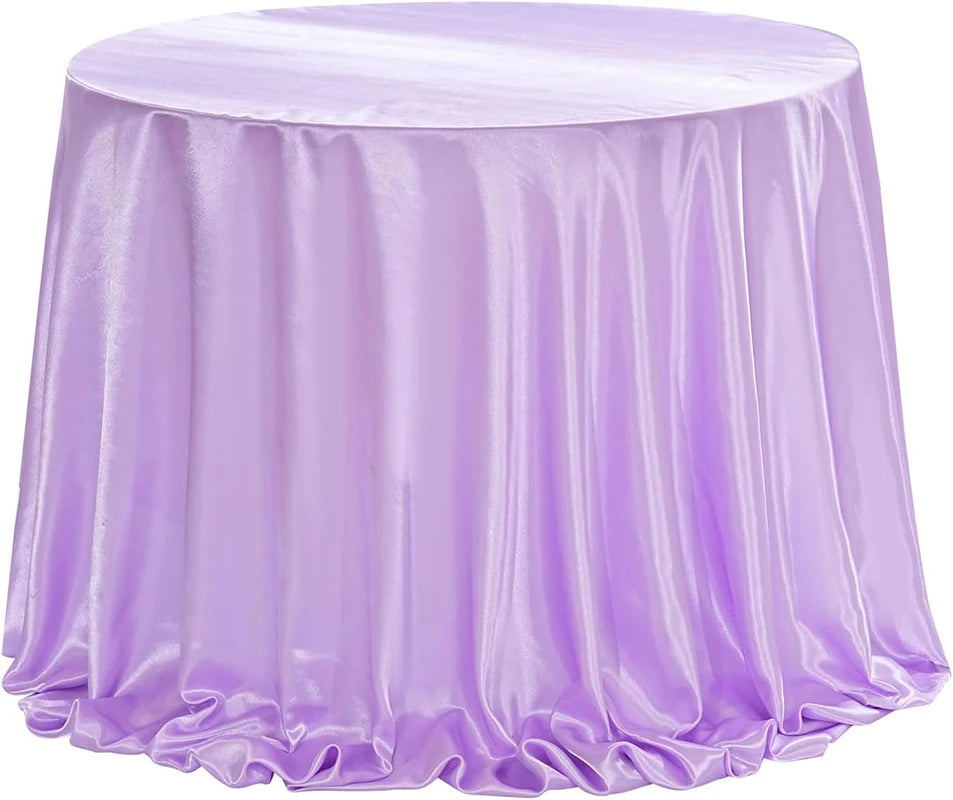 Elegant purple satin tablecloth draped on a round table for events