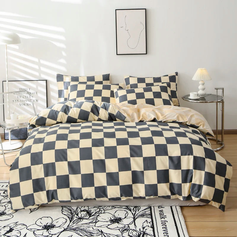 A checkered print bedding set featuring a duvet cover and pillowcases in beige and dark gray tones.