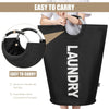 A black waterproof laundry basket with an aluminum handle is shown being held by a person.