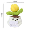 Handmade crochet positive energy doll featuring yellow and green yarn textures.