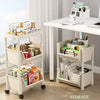 A white mobile multi-tier storage cart with wheels is shown holding various office supplies and books on a modern desk.
