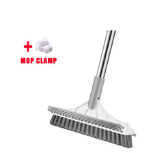A silver mop clamp and a rotating floor scrub brush with a long handle.
