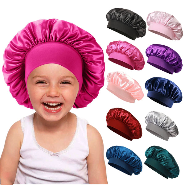 A young child models a bright pink satin sleep bonnet, with various colored bonnets shown separately.