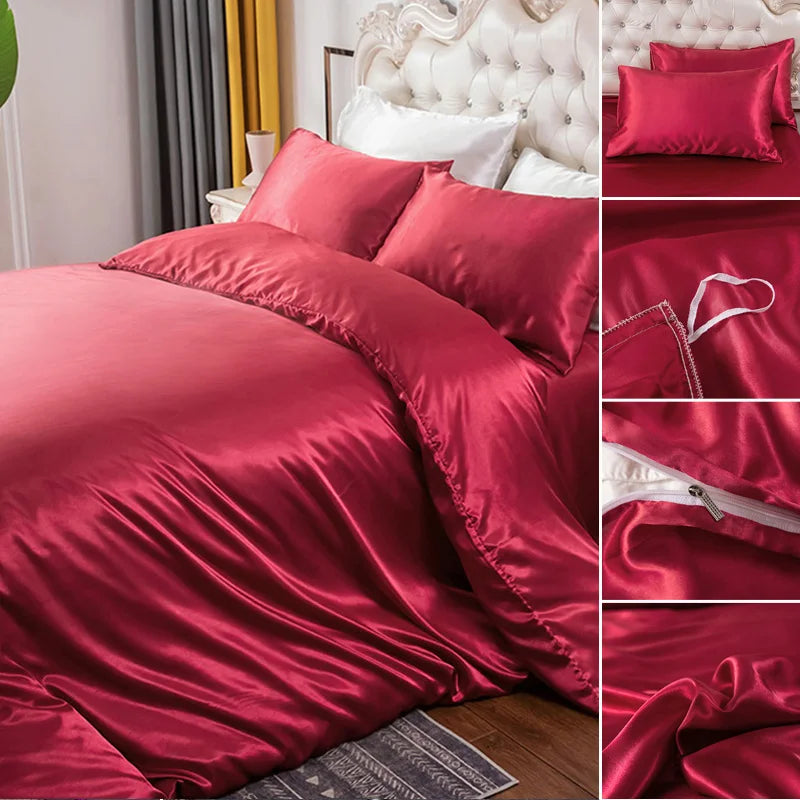 A set of deep red silky duvet covers featuring corner ties and a zipper, shown in various folds.