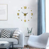 A modern living room features a white wall with a gold-toned clock and a gray sofa, next to a window with blue curtains.