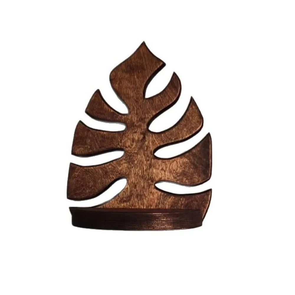 A rustic wooden wall-mounted storage rack featuring a leaf design for plant decor.