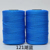 Two spools of bright blue 3-ply polyester knitting yarn for crochet and hand crafts
