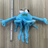 A soft blue plush toy resembling an octopus or squid with large eyes and tentacles.