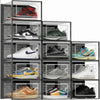 A grid of twelve clear plastic storage boxes holding various sneakers and shoes.