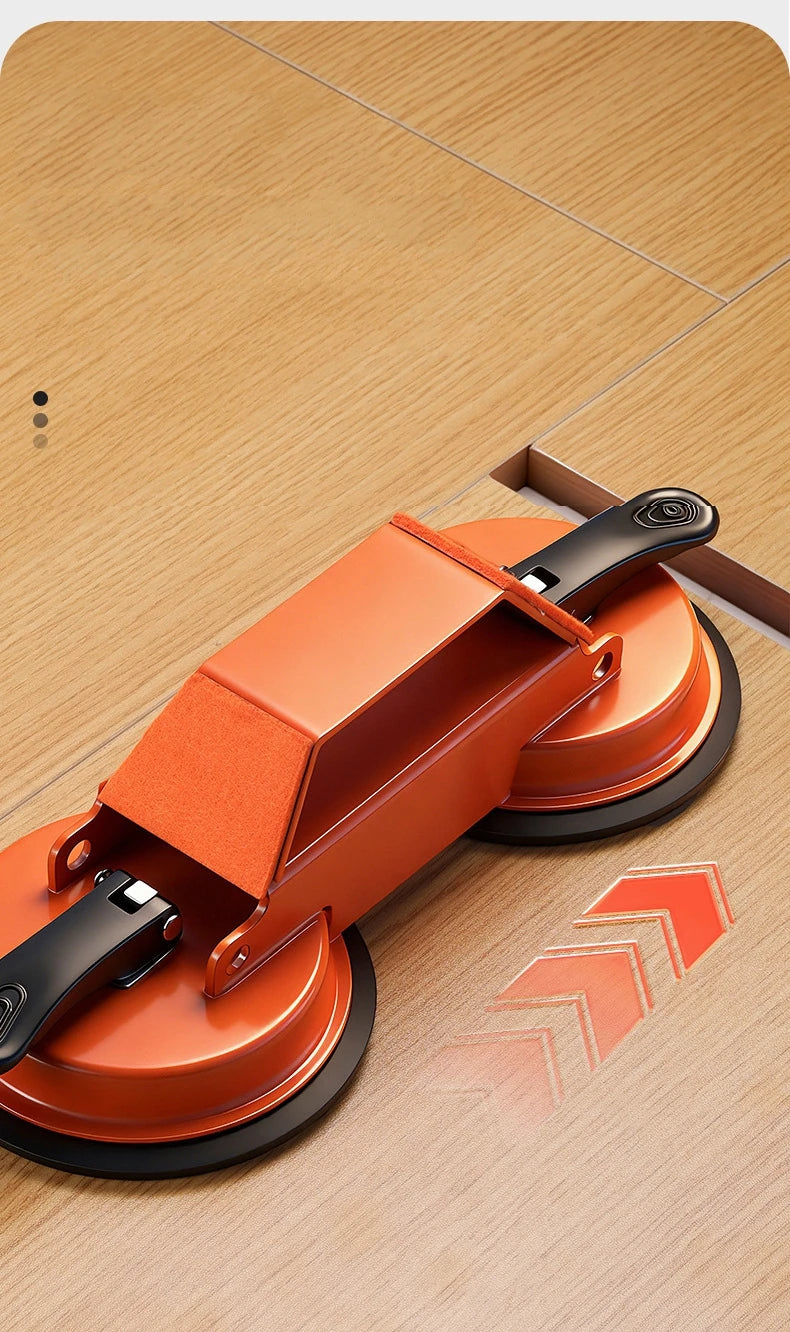 An orange floor gap repair tool with a suction cup is shown on a light wood floor.