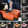 Orange car armrest cushion with storage and cup holders shown in a car interior.