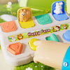 A Montessori pop-up dinosaur toy featuring a yellow farm scene and a blue animal for toddlers.