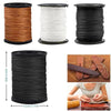 Rolls of heavy duty nylon thread in brown, white, and black for upholstery repair