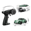 A black RC drift car is shown with its packaging and a remote control device.