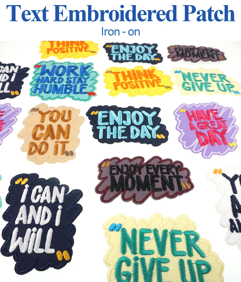 A collection of colorful text embroidered iron-on patches featuring positive affirmations like Think Positive Enjoy the Day a