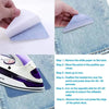 Demonstration of using a cotton iron-on patch for denim repair and decoration on fabric.
