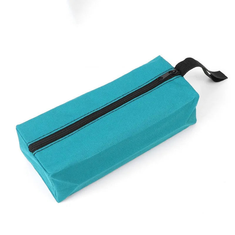 A teal fabric tool organizer bag with a black zipper and strap.